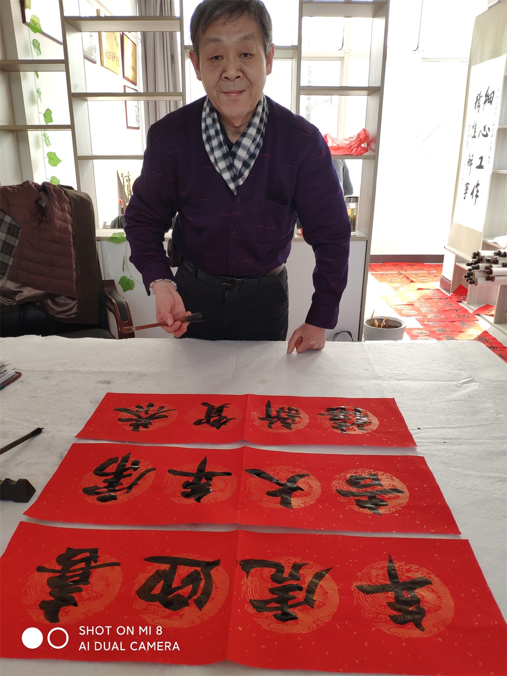 春节前夕,淮安书画家为市民送祝福