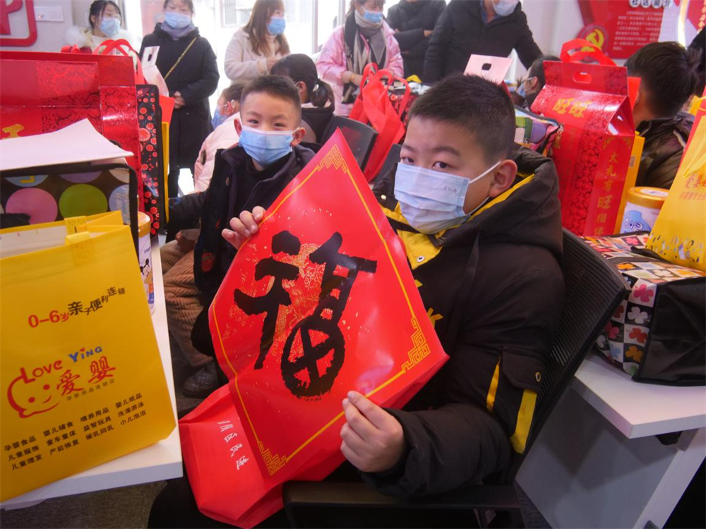 淮安市王家营街道举办“把爱带回家 冬日暖童心”活动